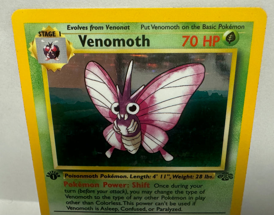 Venomoth 13/64 1ST Edition - Jungle (JU) - Lightly Played